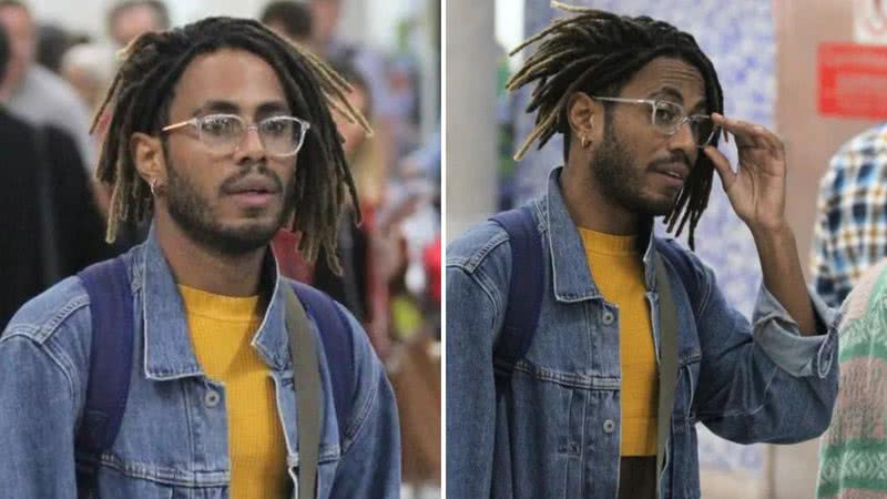 O ator Ícaro Silva arrasa com look fashionista em aeroporto acompanhado do namorado, o cantor Izrra; veja - Reprodução/AgNews