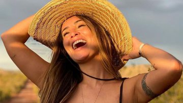 Após polêmica, Carol Nakamura aparece sensualizando e sorrindo: "Que o sol volte a brilhar" - Reprodução/TV Globo