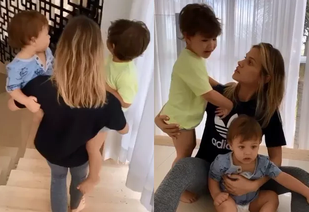 Andressa Suita surge com os dois filhos no colo e brinca: 'Treino de braço'