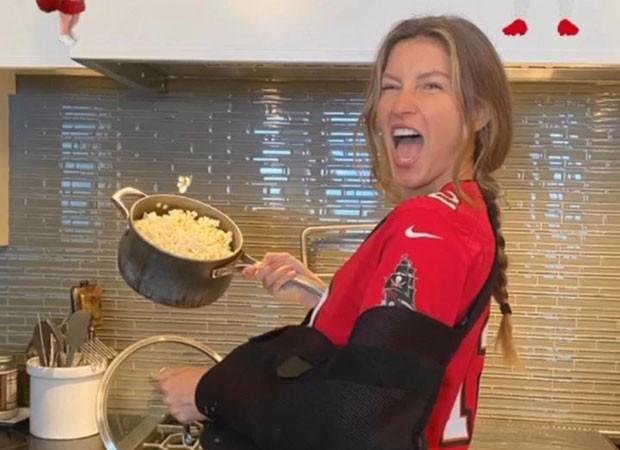 Gisele Bündchen tranquiliza fãs ao aparecer com tipoia no braço