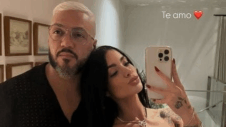 E a Rayane? Belo sai acompanhado por uma mulher de show