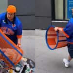 Virou meme? Torcedora é flagrada vandalizando calçada e roubando lixeira na Copa