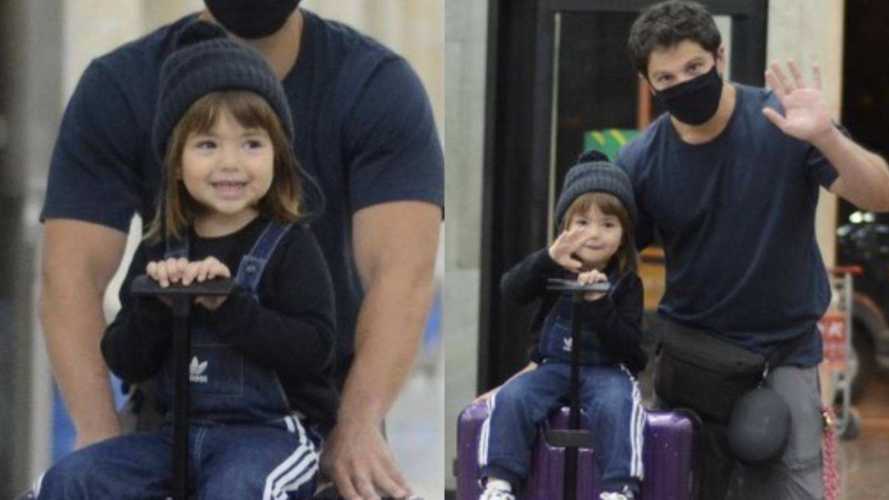 Alerta de fofura! No aeroporto, filha de Sabrina Sato dá de cara com paparazzo e acena para a câmera