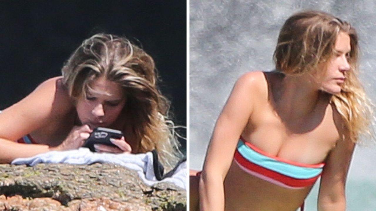 Com biquíni sem alças, Isabella Santoni exibe corpo real ao ser flagrada tomando sol em praia no Rio