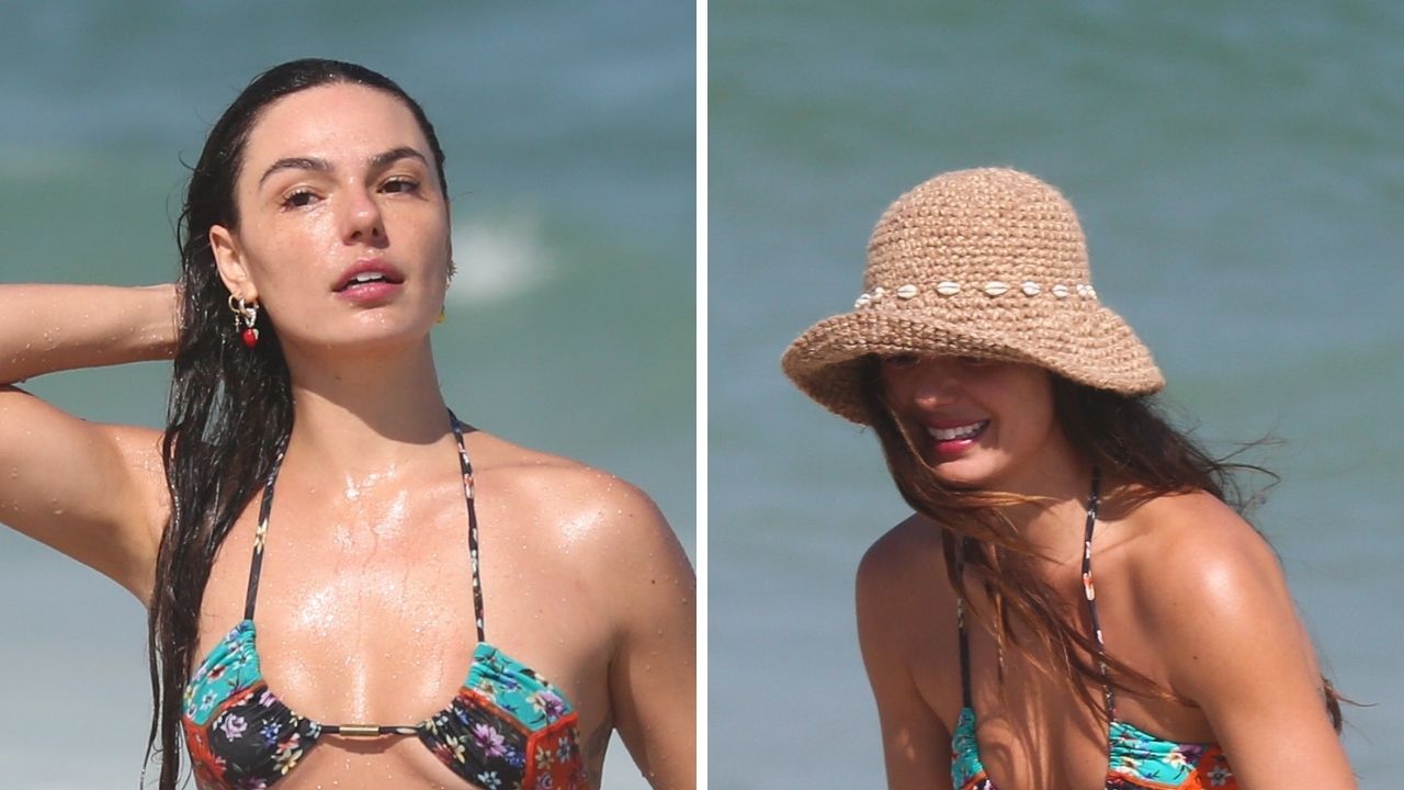 Com biquíni fio-dental, Isis Valverde vai à praia com o filho e corpo espetacular atrai olhares