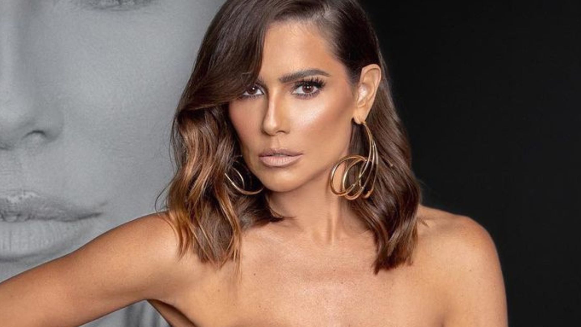 Deborah Secco exibe decotão profundo em vestido nude e marca curvas: “Exuberante”