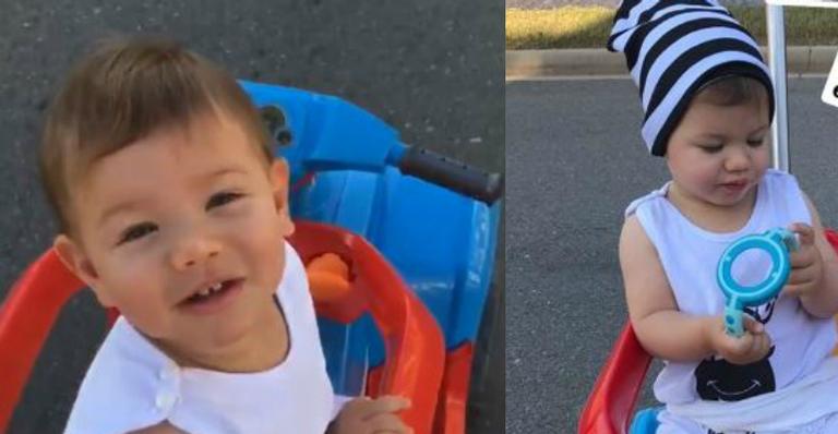 Fofura! De touquinha, filho mais velho de Andressa Suita, Gabriel, esbanja fofura em passeio pelo condomínio do casal