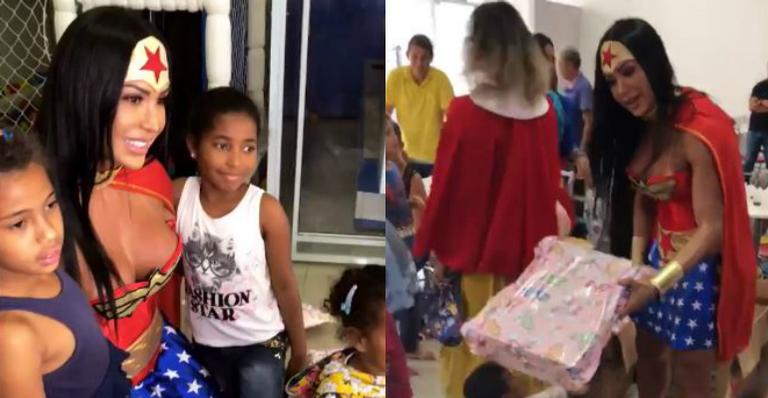Gracyanne Barbosa se veste de ‘Mulher Maravilha’ e presenteia crianças carentes