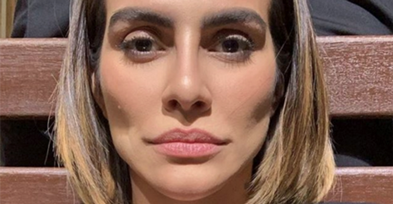 De férias da TV, Cleo surge com novo visual e escurece o cabelo