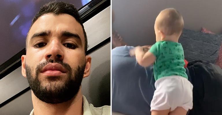 Em vídeo, Gusttavo Lima surge ”desmaiado” e caçula, Samuel, tenta acordá-lo