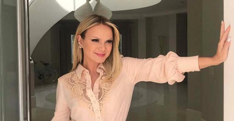 Eliana faz rara aparição com o ex-marido em foto com o filho