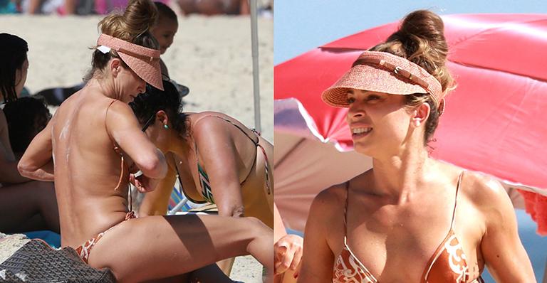 Grazi Massafera exibe corpo perfeito ao renovar bronzeado com biquíni mínimo
