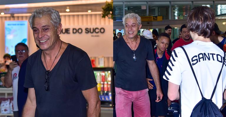 Paulo Gorgulho é só sorrisos ao buscar o filho em aeroporto após campeonato de judô