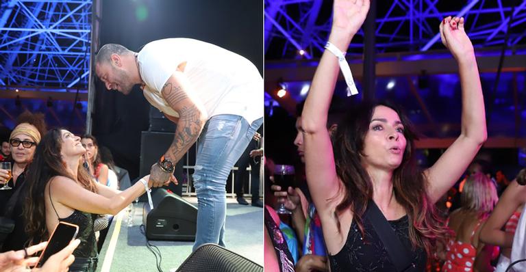 Claudia Ohana se joga, samba muito e ganha o carinho de Diogo Nogueira em show