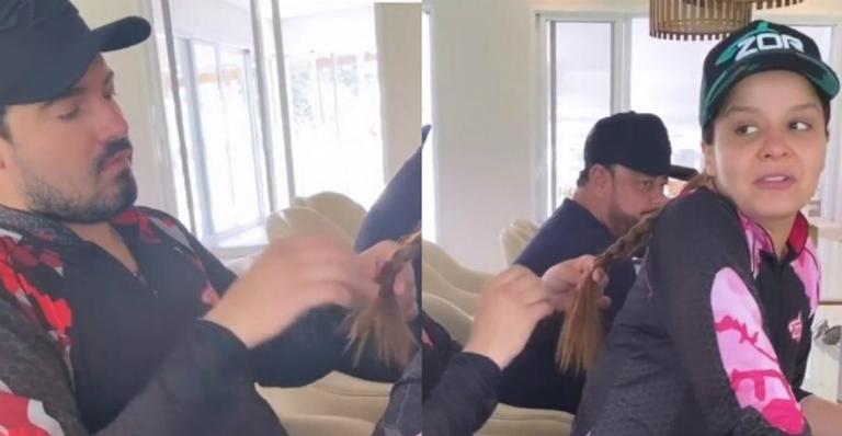 Fernando Zor surge concentrado em vídeo fazendo penteado em Maiara