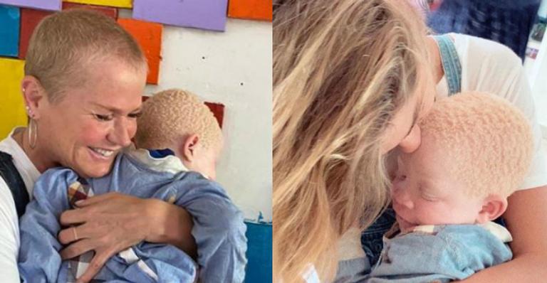 Xuxa e Sasha Meneghel se divertem com crianças durante viagem pela Angola