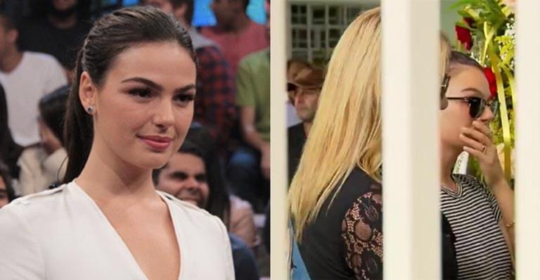 Isis Valverde é amparada pela mãe no velório do pai