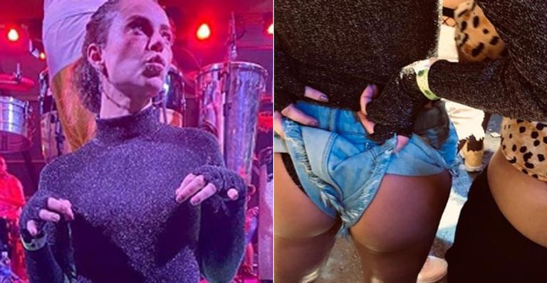 Paolla Oliveira se joga na farra e ergue shortinho jeans para exibir a calcinha