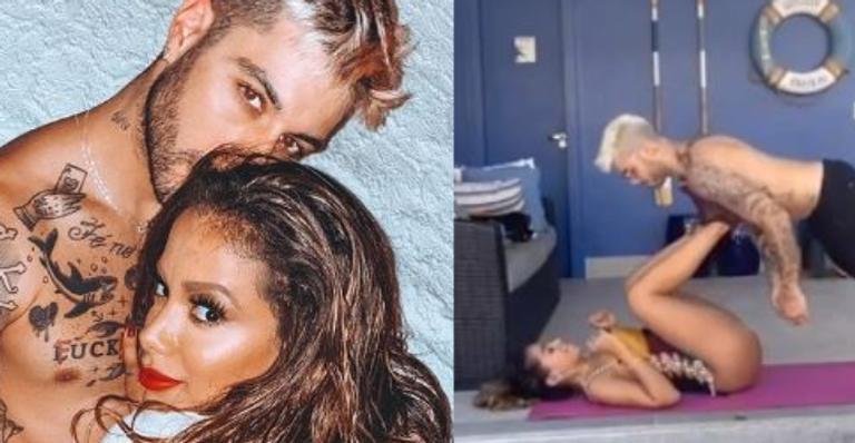 De maiô, Anitta usa namorado como peso para treinar pernões musculosos