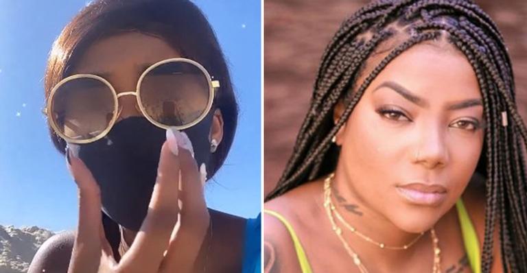 Protegida! Irmã gata de Ludmilla vai à praia de máscara e posa nas areias exibindo o corpão
