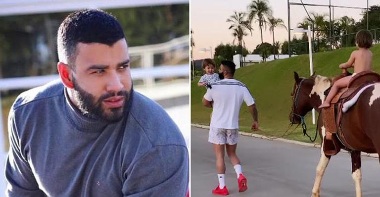 Papai coruja! Gusttavo Lima guia cavalo do primogênito, Gabriel, em passeio com filhos