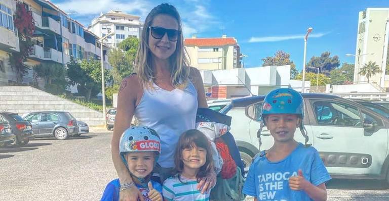 Luana Piovani curte dia ensolarado em cachoeira ao lado dos herdeiros