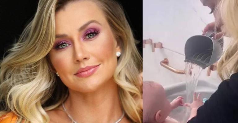 Ana Paula Siebert dá banho na filha e olhos azuis da pequena chamam atenção