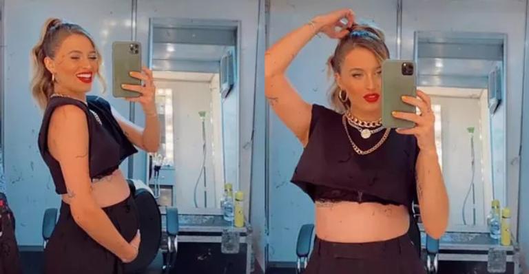Grávida, Lorena Carvalho deixa barriga à mostra em gravação de DVD de Lucas Lucco