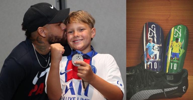 Neymar Jr. mostra caneleira com foto do herdeiro jogando futebol