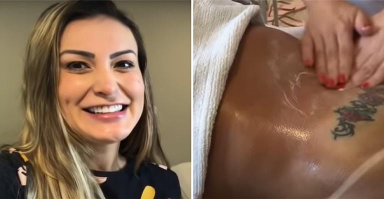 Andressa Urach exibe marquinhas de bronzeado ao registrar sessão de massagem
