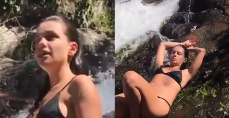De biquíni, Bruna Linzmeyer toma banho de cachoeira e barriguinha saliente rende elogios: “Me representa”