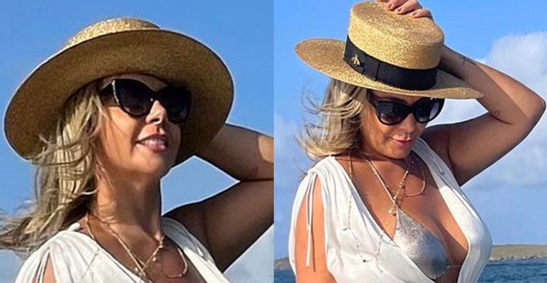 Aos 43 anos, Carla Perez posa em barco de luxo com look transparente e biquíni aparece: “Eternamente linda”
