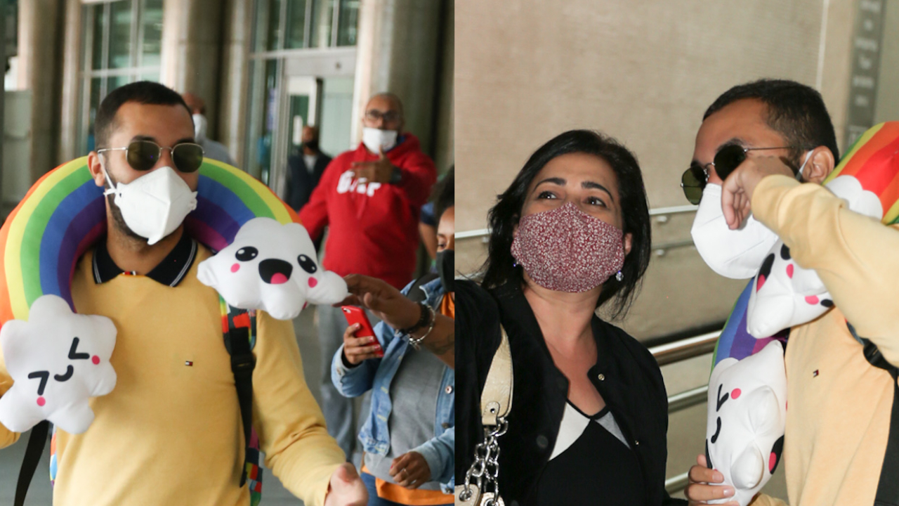 Todo estiloso, ex-BBB Gilberto desembarca com acessório divertido em São Paulo e posa para fotos com fãs