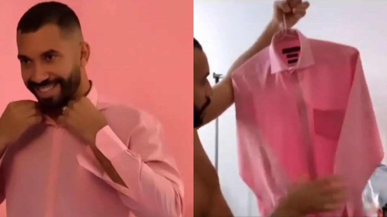 Ex-BBB Gilberto usa camisa rosa do reality para fotografar cliques de seu novo livro: “Ela me livrou de 7 paredões”