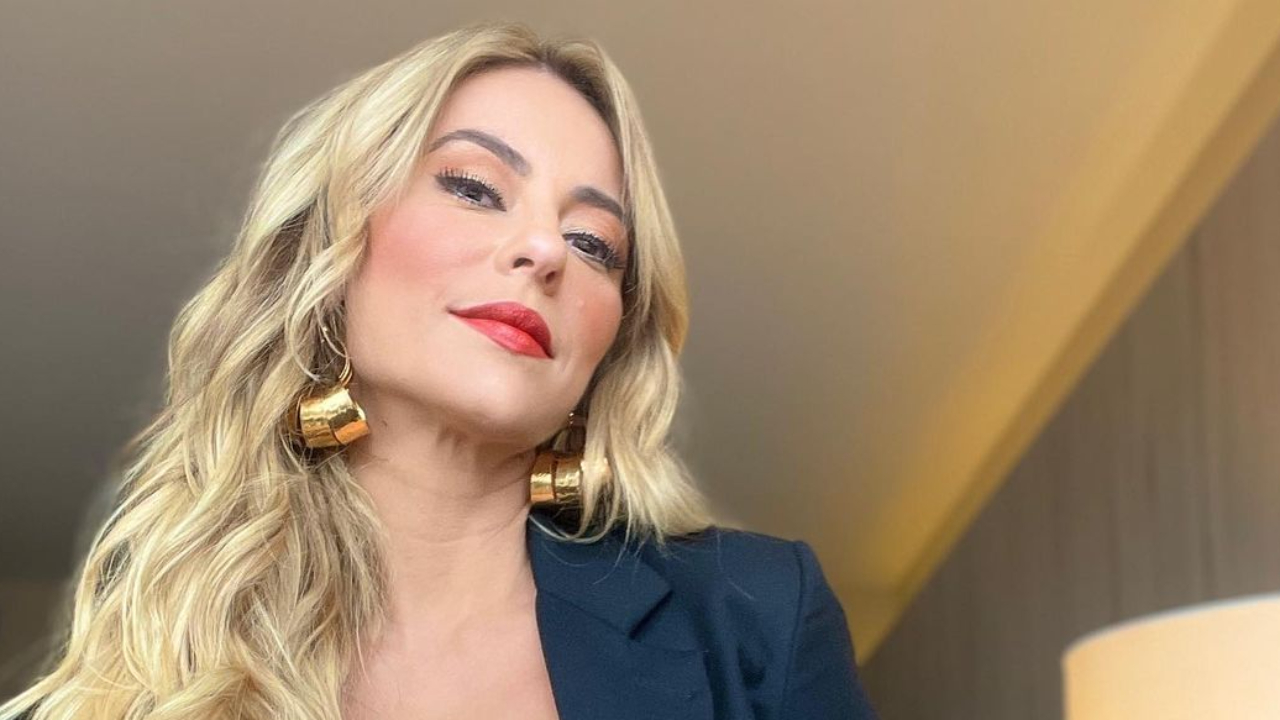 Aos 39 anos, Paolla Oliveira abre o blazer e deixa top branco e decote generoso à vista: “Diva”
