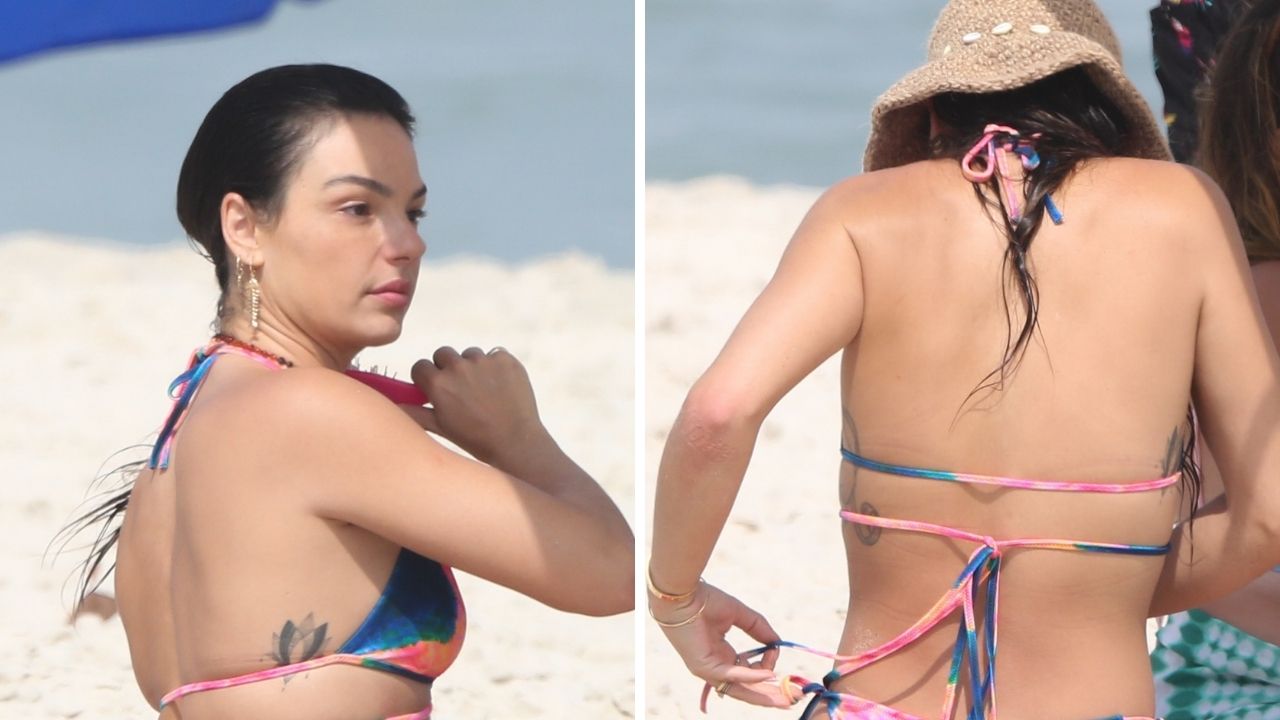 Espetáculo! Isis Valverde dá ajeitadinha estratégica no biquíni fio-dental ao ir à praia em dia de calorão